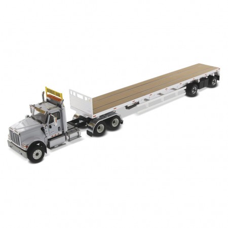 Caminho Diecast Masters - International Hx520 Tandem Tractor Flat Bed Trailer Cinza - Escala 1/50 (71041)