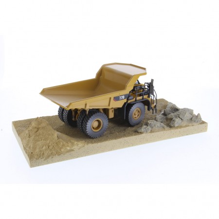 Caminho Diecast Masters: Cat 770 Off-highway Truck Weathered Series - Escala 1/50 (85756